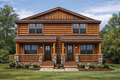 Log cabin house plan by Lance Fuller Designs with wooden exterior and stone accents in a suburban setting.